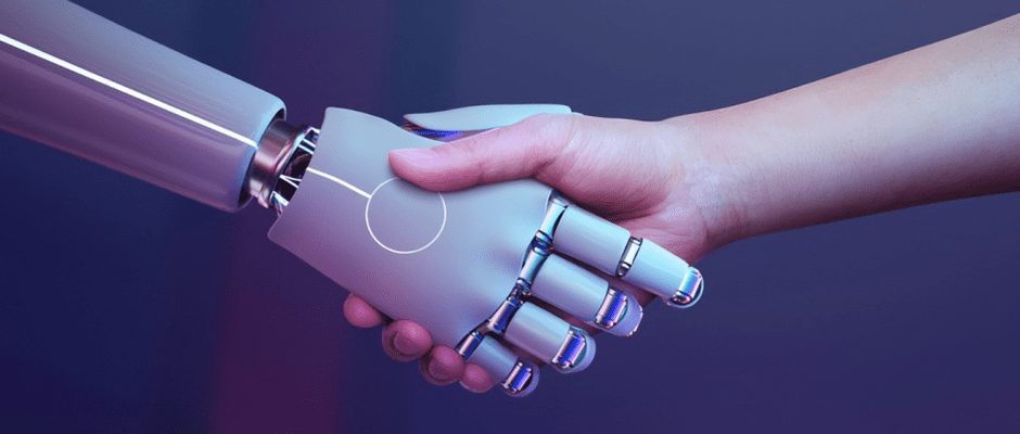 Mano robótica y mano humana saludándose. La inteligencia artificial está revolucionando nuestro mundo